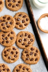 cashew butter cookies on pan with chocolate chips