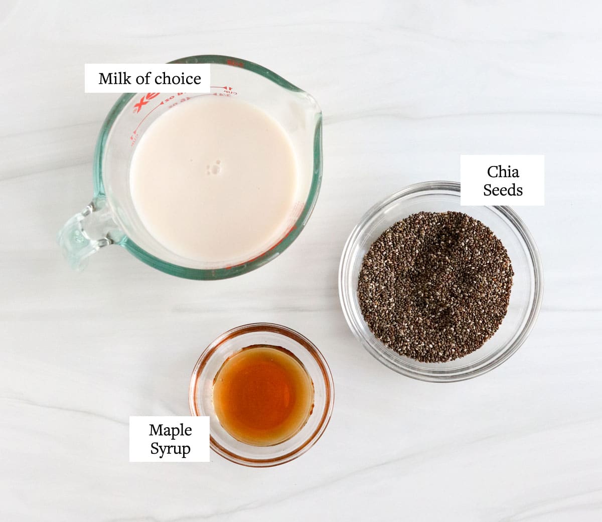 chia seed pudding ingredients in glass jars.