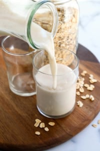 oat milk poured into glass